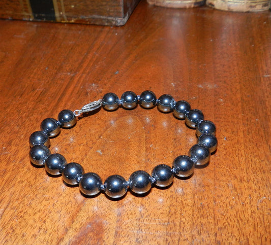 7" Authentic Hematite Spheres Hand Knotted Bracelet - Sterling Silver Clasp